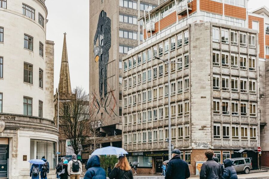 Bristol: Blackbeard to Banksy Guided Walking Tour - The Norman castle site and WWII blitz damage, where the story gets serious