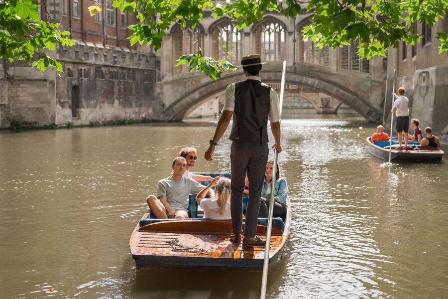 Cambridge: Guided Shared River Punting Tour - Clare College Gardens and the Wren Library angle you will remember