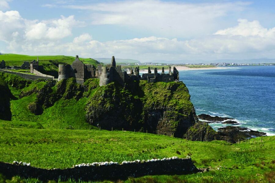 Dublin: Giant's Causeway, Dark Hedges & Titanic Guided Tour - Dunluce Castle Ruins: The 10-Minute Atlantic Photo Stop You Should Stretch