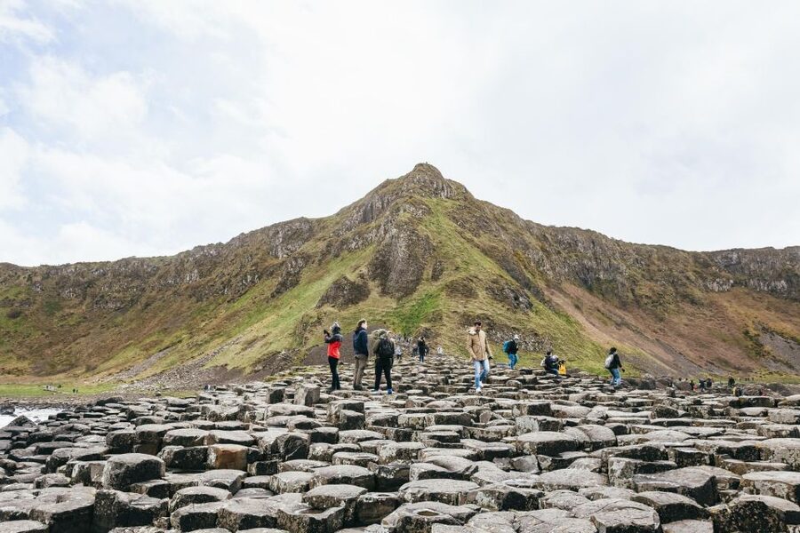 From Belfast: Giant's Causeway Full-Day Guided Trip - Carrickfergus Castle Photos and the Northern Coast Road Rhythm