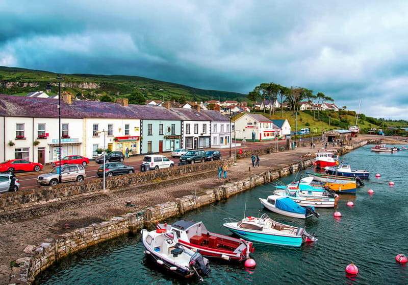 From Belfast: Giant's Causeway Guided Day Tour With Castles - The coast drive: Carnlough Harbour, Cushendun caves area, and the glens