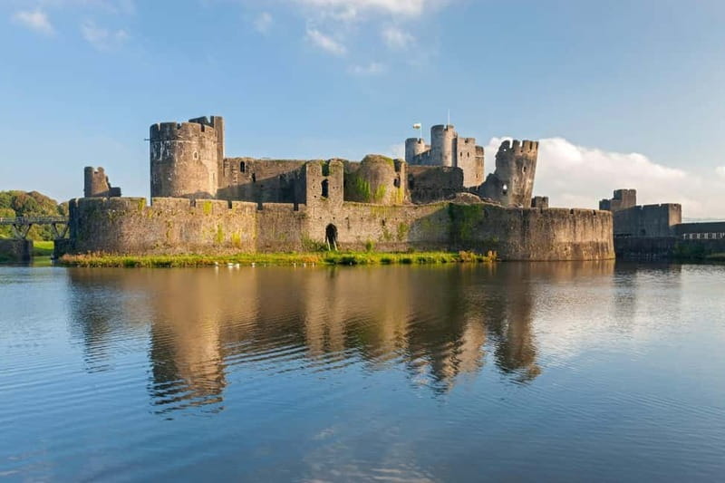 From Cardiff: Caerleon, Tintern Abbey and Three Castles Tour - Caerphilly Castle: the moat, the towers, and the leaning tower