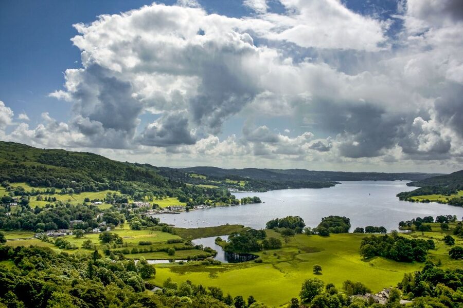From London: Lake District Tour with Cream Tea & Cruise - Wray Castle views over Lake Windermere, the big reveal moment