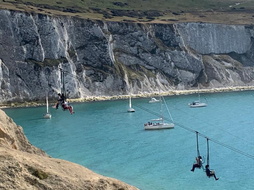 From Portsmouth: Isle of Wight Day Tour by Bus and Ferry - The Needles: chairlift convenience or stairs down to the beach