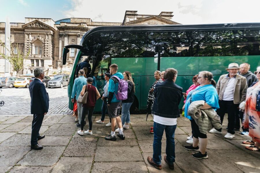 Liverpool: Official Peaky Blinders Coach Tour of Merseyside - On the coach: how the tour uses show clips to guide your eyes