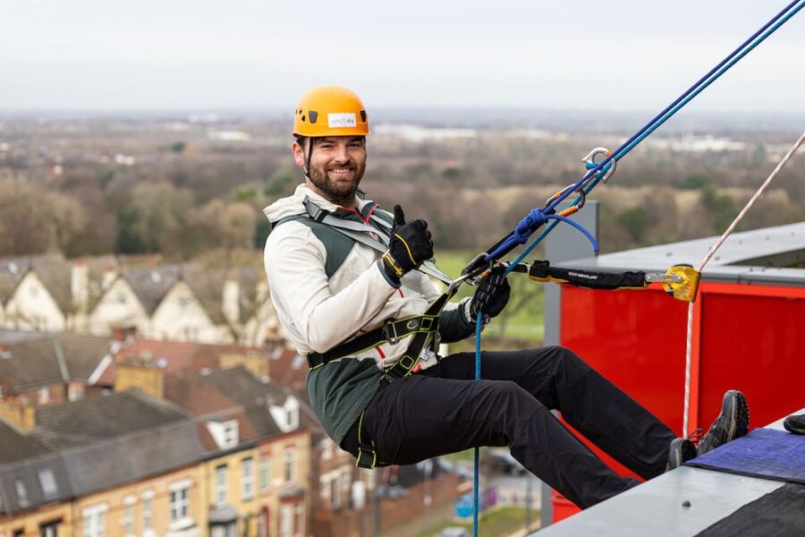 Liverpool: The Anfield Abseil & Liverpool FC Museum - Midway by the LFC crest: the most iconic pause in the experience