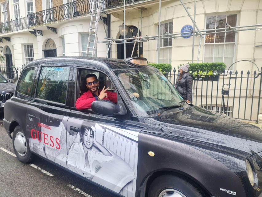 London: Rock N Roll Beatles Private Black Cab Tour - Gibson Garage stop and the 10% merchandise perk