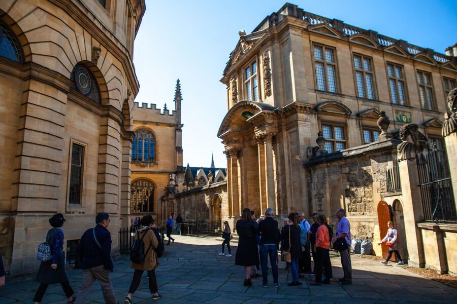 Oxford: Private Walking Tour with University Alumni Guide - Sheldonian Theatre and the Drama of Oxford’s Public Spaces