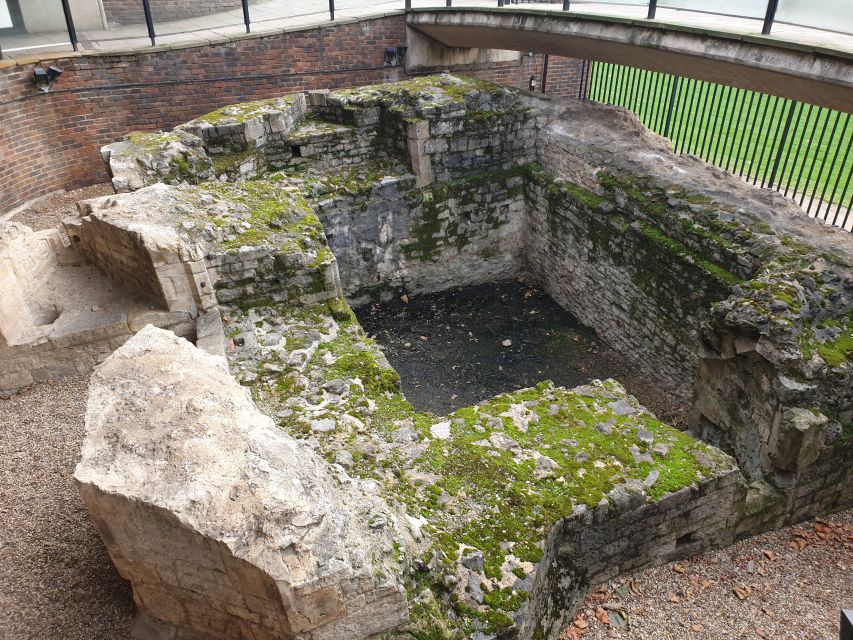 Roman Ruins to Blitz Bombings: London's Fiery History - The Monument to the Great Fire and London Stone’s surviving chunk