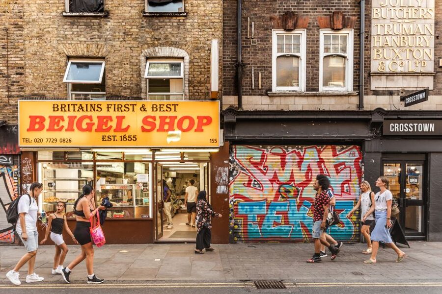 Shoreditch: Street Art & Hidden Gems with a Local Host - Brick Lane: Food Stalls, Indian Restaurants, Shops, and Cafe Stops
