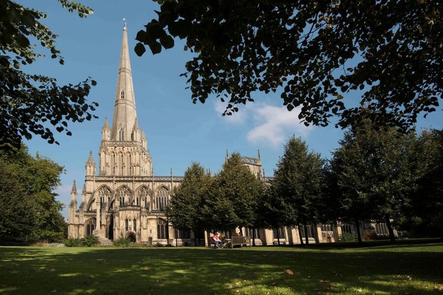 St Mary Redcliffe Church Bristol: Guided Tour - Outside the North Porch: Stone Carvings and the Tower-SPIRE View