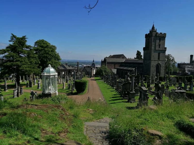 Stirling: Daily Guided Walking Tour with a Local Guide - Cowanes Trust and Old Town Cemetery, where you learn to decode gravestones
